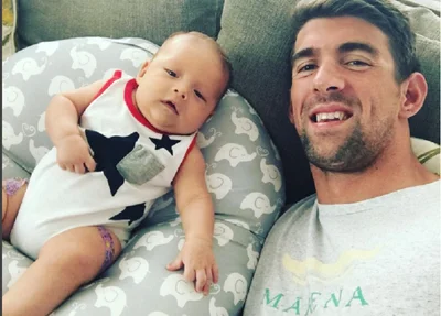 Michael Phelps e seu filho de 3 meses