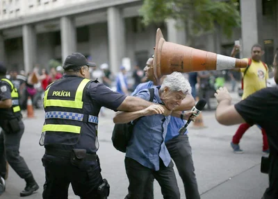 Caco Barcellos foi agredido por manifestantes