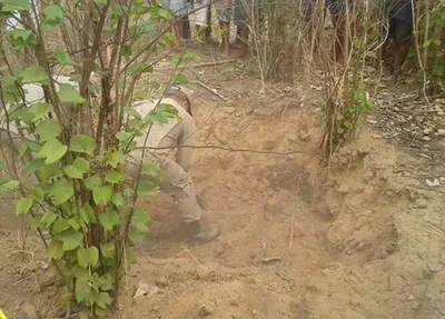 Corpo de Bombeiros desenterram o corpo encontrado