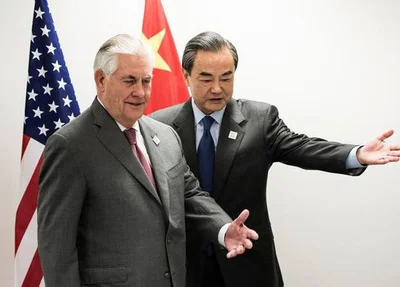  Secretário de Estado dos EUA, Rex Tillerson, e o ministro das Relações Exteriores da China, Wang Yi 