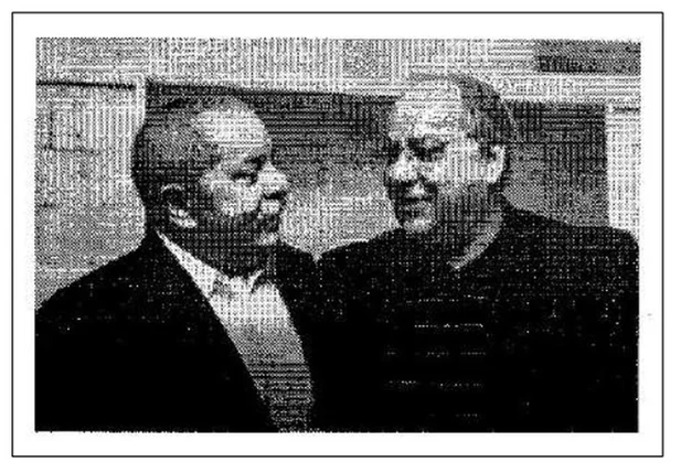 Esta imagem em preto e branco, que mostra Lula e Duque, foi anexada pela defesa do ex-diretor