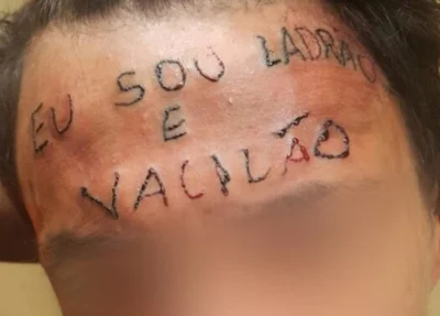 Jovem acusado de roubo é tatuado na testa