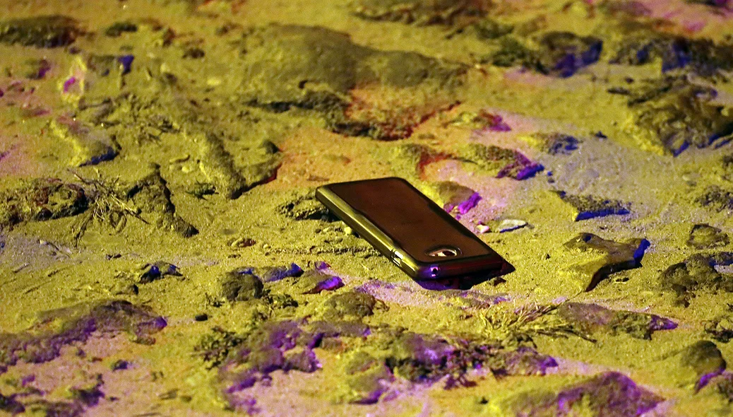 Celular encontrado com assaltante