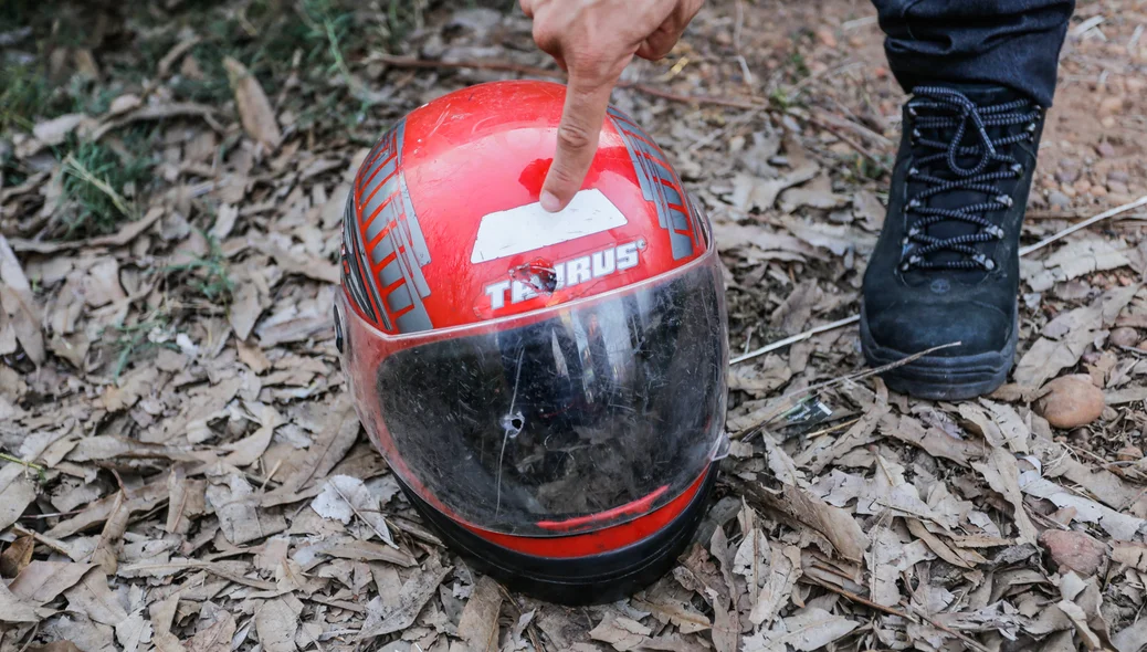 Marcas de Tiro no capacete