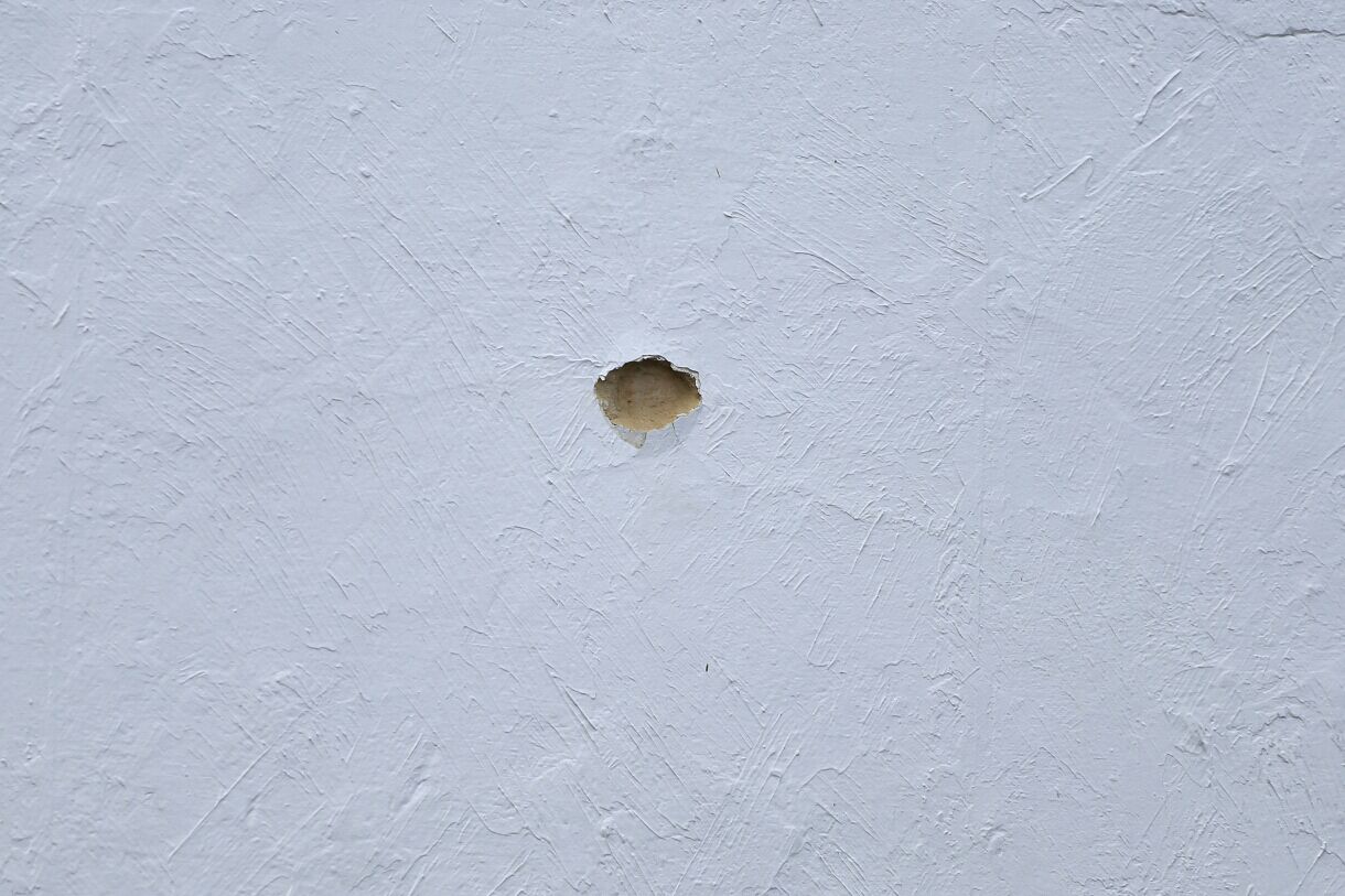 Um dos disparos atingiu uma parede
