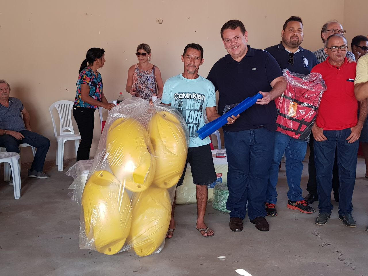 Deputado Silas Freire e Stanley Freire com piscicultores