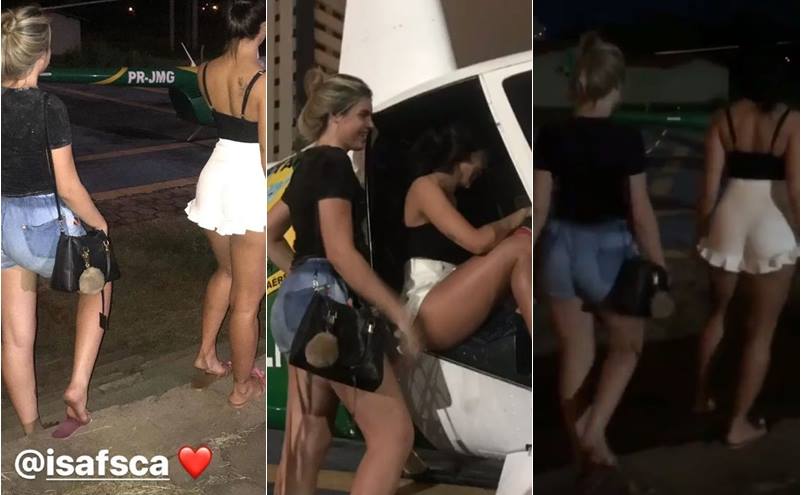 Mulheres tiram fotos no helicóptero da PM-PI