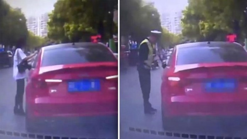 Mulher põe multa falsa na janela do carro para evitar multa real na China