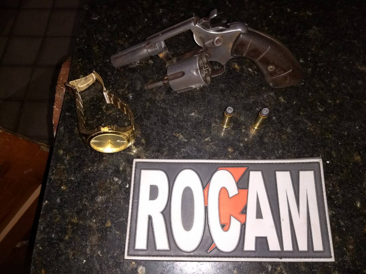 Arma apreendida com o acusado