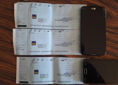 Cheques encontrados com os acusados