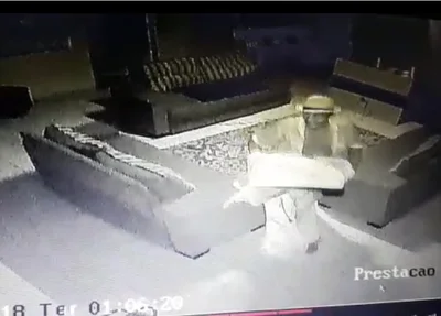 Bandido é flagrado por câmeras de segurança
