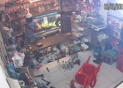 Bandido atira em comerciante 
