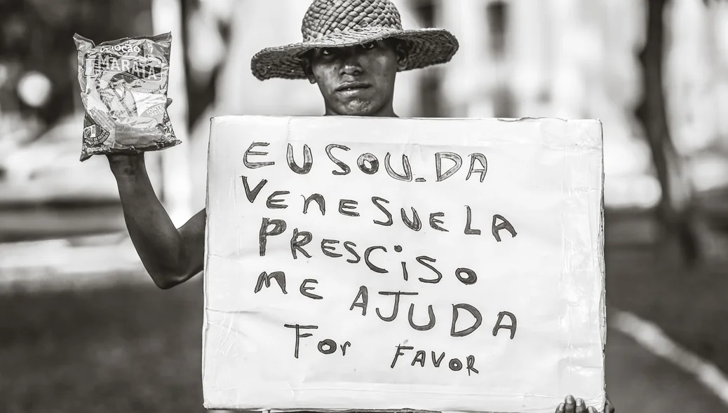 Venezuelano pedindo ajuda
