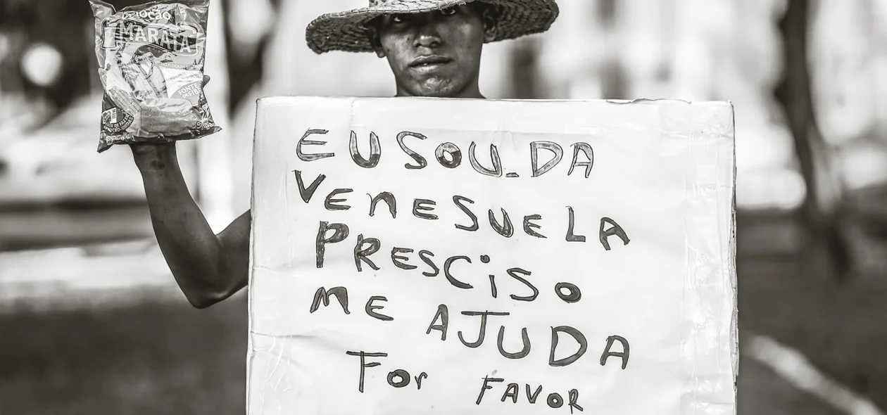 Venezuelano pedindo ajuda