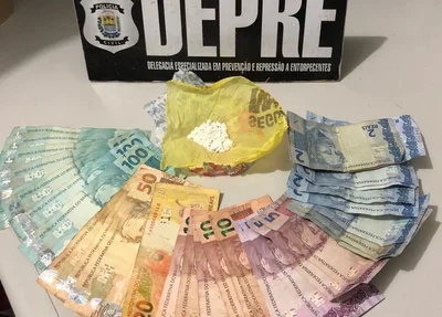 Dinheiro e drogas apreendidas