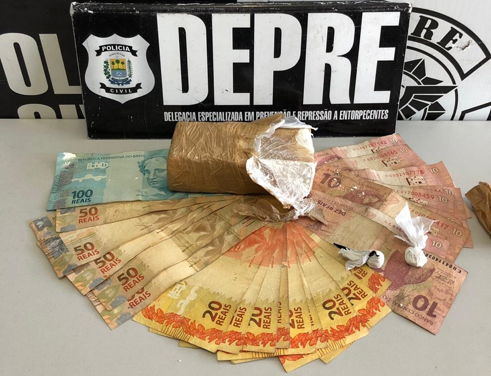 Dinheiro e drogas apreendidas