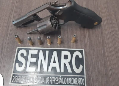 Arma e munições apreendidas