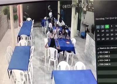 Câmera flagra cliente sendo baleado em pizzaria