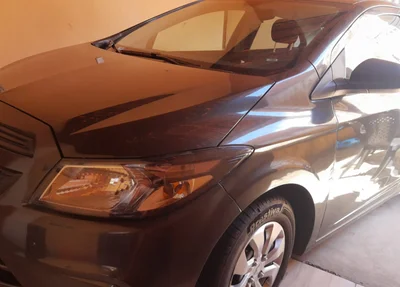 Veículo modelo Prisma cinza de placa QPR 1396/Belo Horizonte- MG