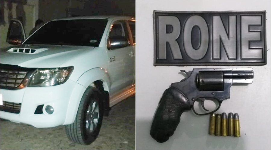 Hilux e arma com munições