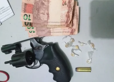Arma de fogo e droga apreendidas