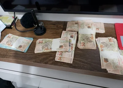 Dinheiro apreendido durante operação da PF contra fraudes no auxílio emergencial em 14 estados