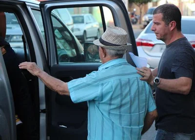 Proprietário sendo conduzido ao Greco 